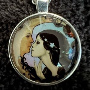 Artistic Silver Pendant Necklace with Crescent Moon Design